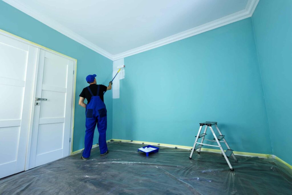 painting contractor, painting the room in sky blue wall to white color
