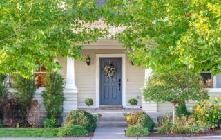 residential home front door painted in grey- front door paint colors 2024